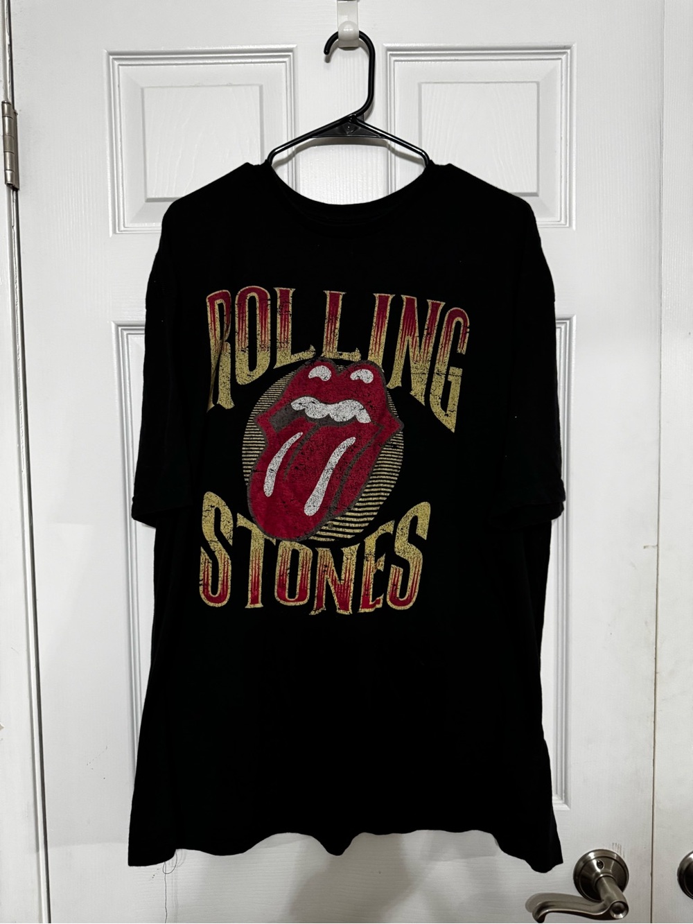 the Rolling Stones Black Tee with White Print and Red Accent